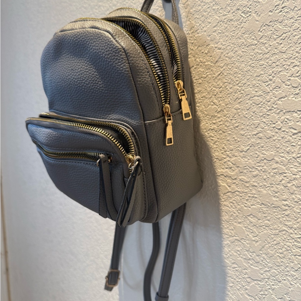Gray Mini Backpack with Gold Zippers